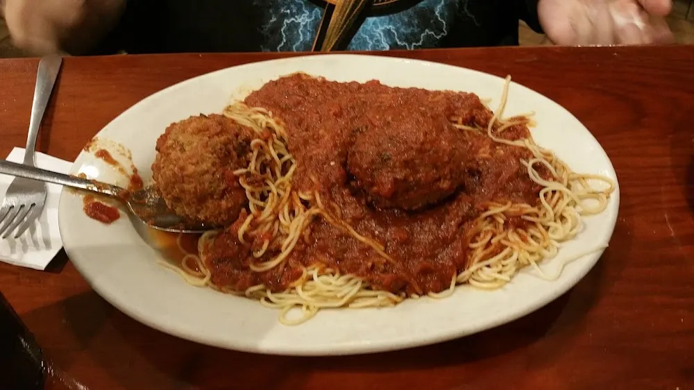 Veal Parmesan on Spaghetti with Meat Sauce